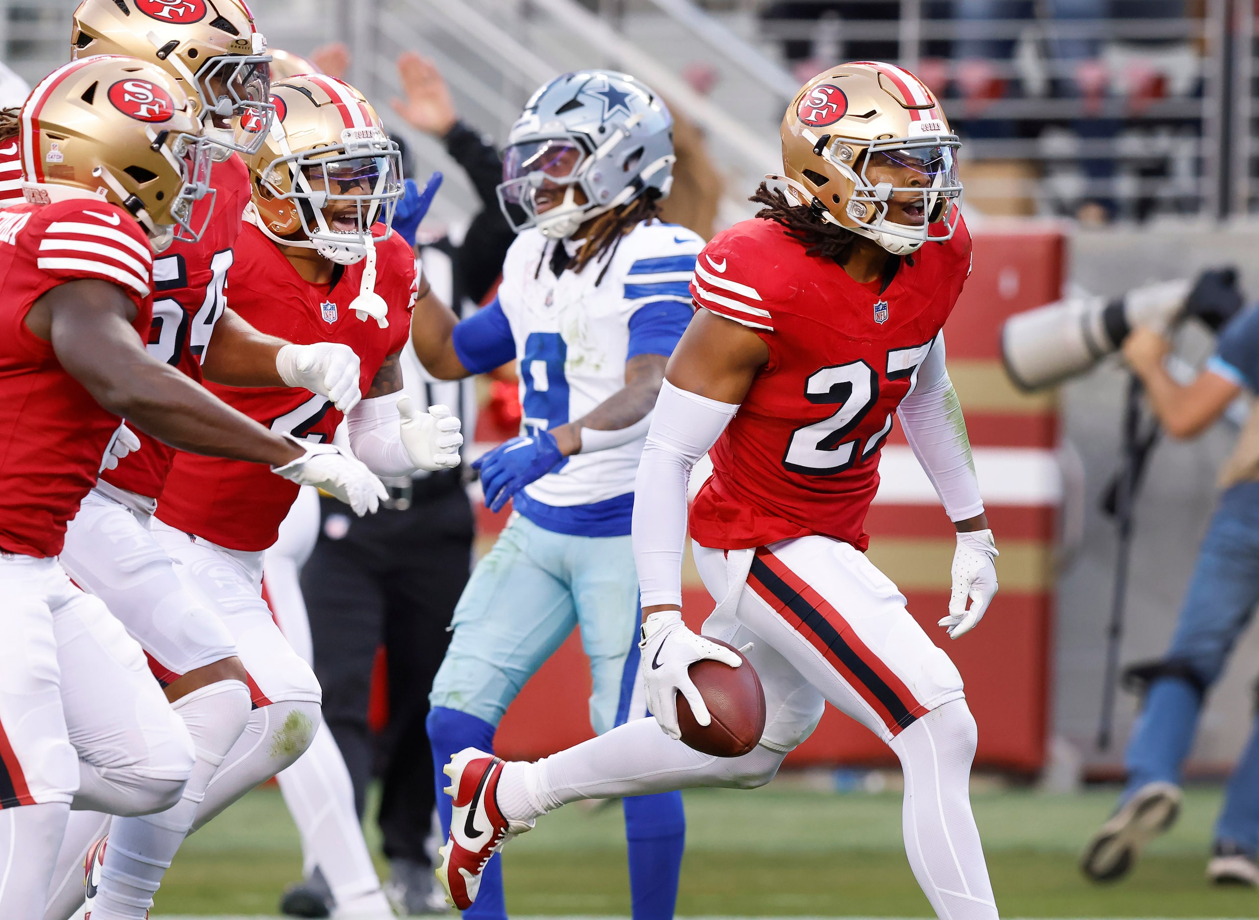 San Francisco 49ers safety Ji'Ayir Brown (27) celebrates his interception on a Dak Prescott...