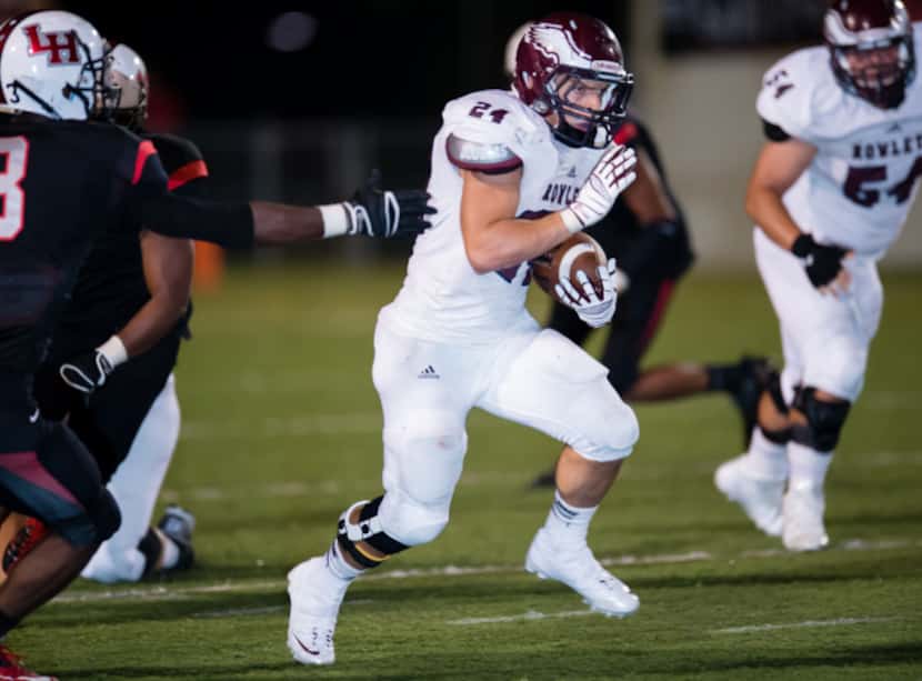 Rowlett running back Anthony Wagner runs up the field in a game against Lake Highlands....
