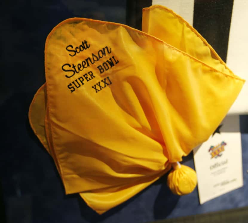 Among retiring NFL official Scott Steenson's memorabilia is the penalty flag he used in...