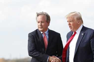 Donald Trump greeted Texas Attorney General Ken Paxton at Austin Bergstrom International...