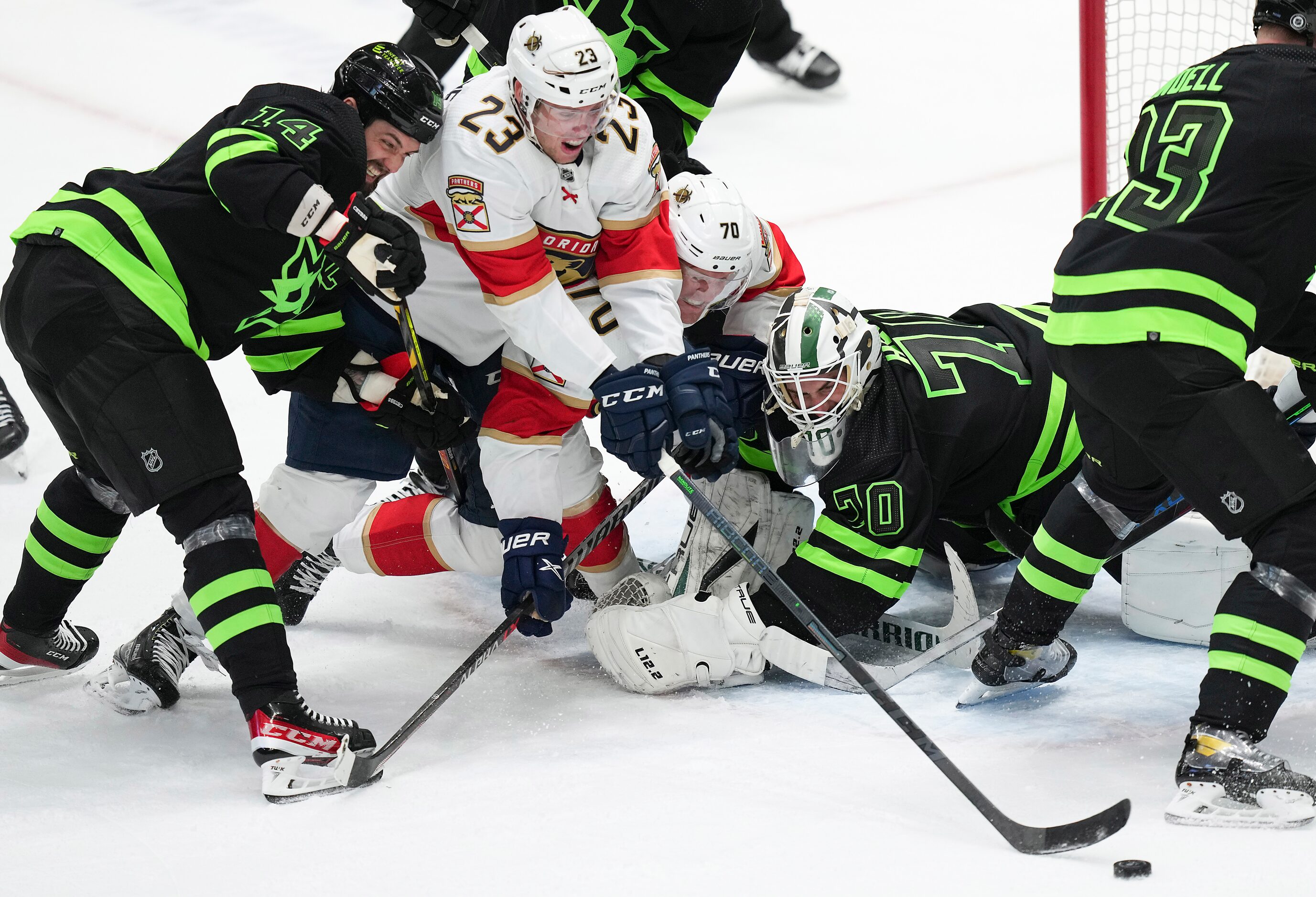 Dallas Stars goaltender Braden Holtby (70) turns away Florida Panthers right wing Patric...