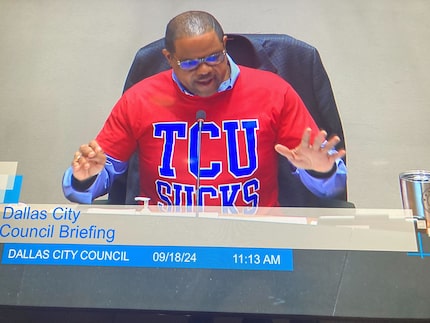 Mayor Eric Johnson wore a “TCU Sucks” shirt at the Dallas City Council meeting Wednesday...