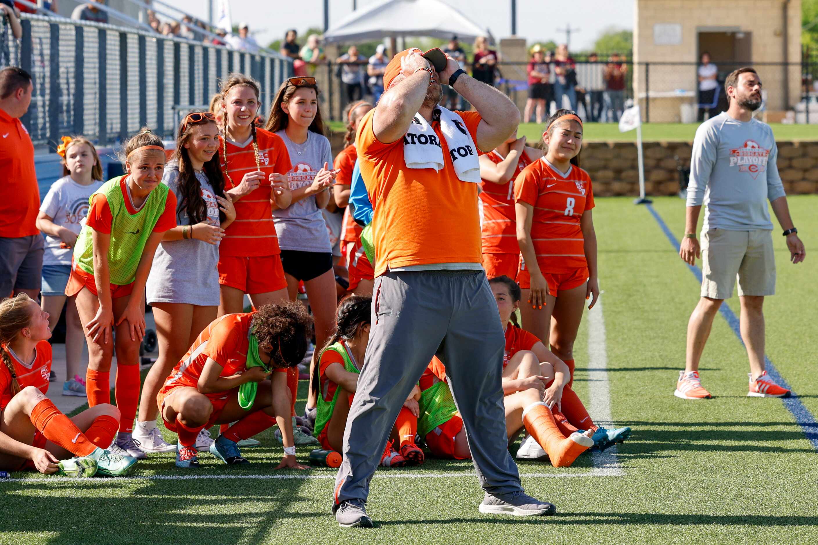Celina head coach Alexander Adams stands nervously on the sideline during a shootout in the...