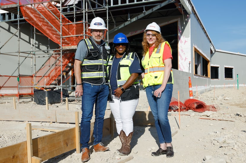 Kevin Boyd (from left), chief facilities planning and construction officer of Metrocare,...