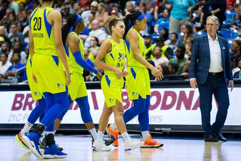 Dallas Wings guard Brooke McCarty-Williams (1) and other players react to a technical foul...