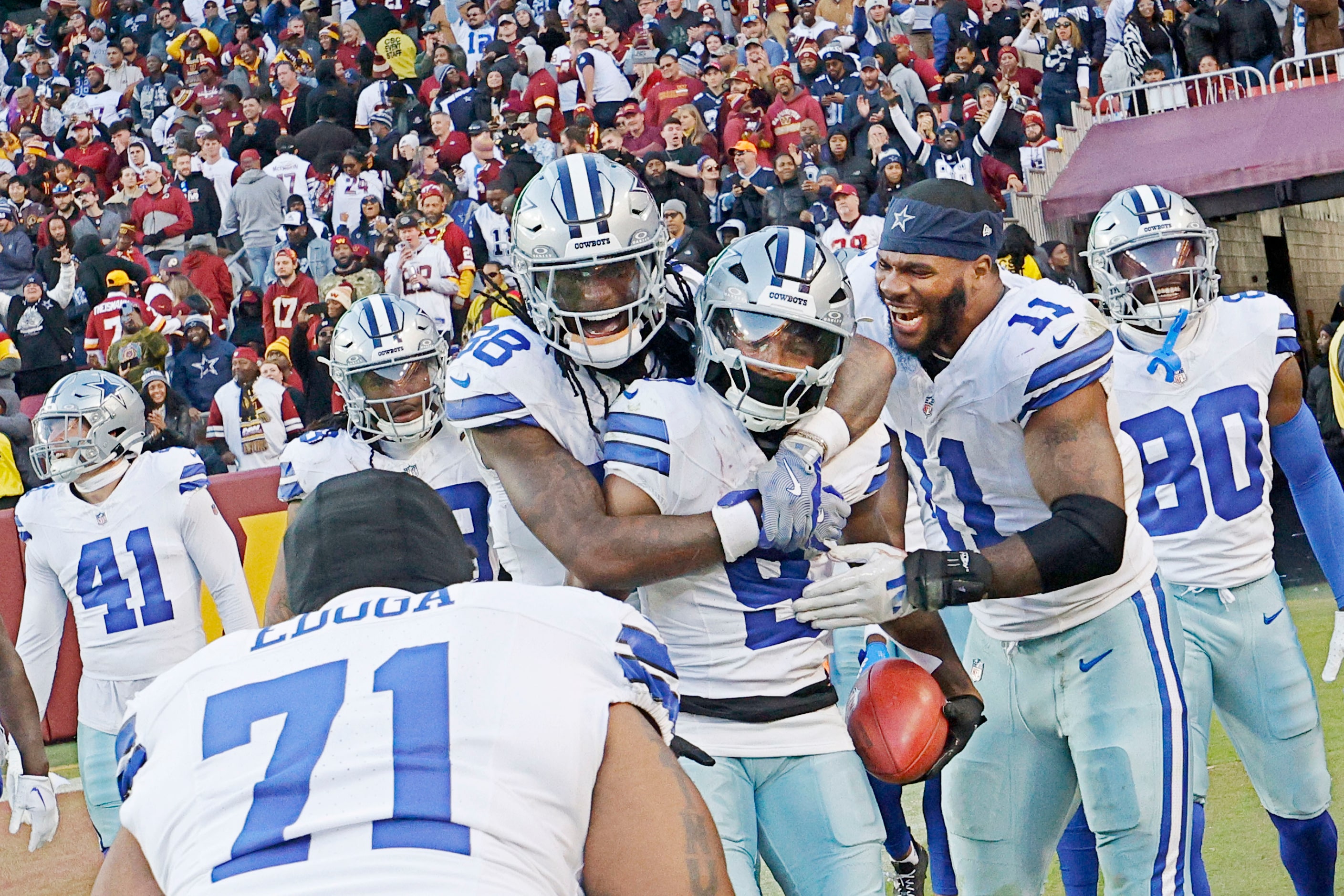 Dallas Cowboys wide receiver KaVontae Turpin (9), center, celebrates with his teammates...