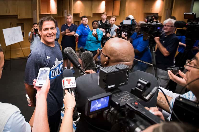Dallas Mavericks owner Mark Cuban talks about the NBA draft during a press availability in...