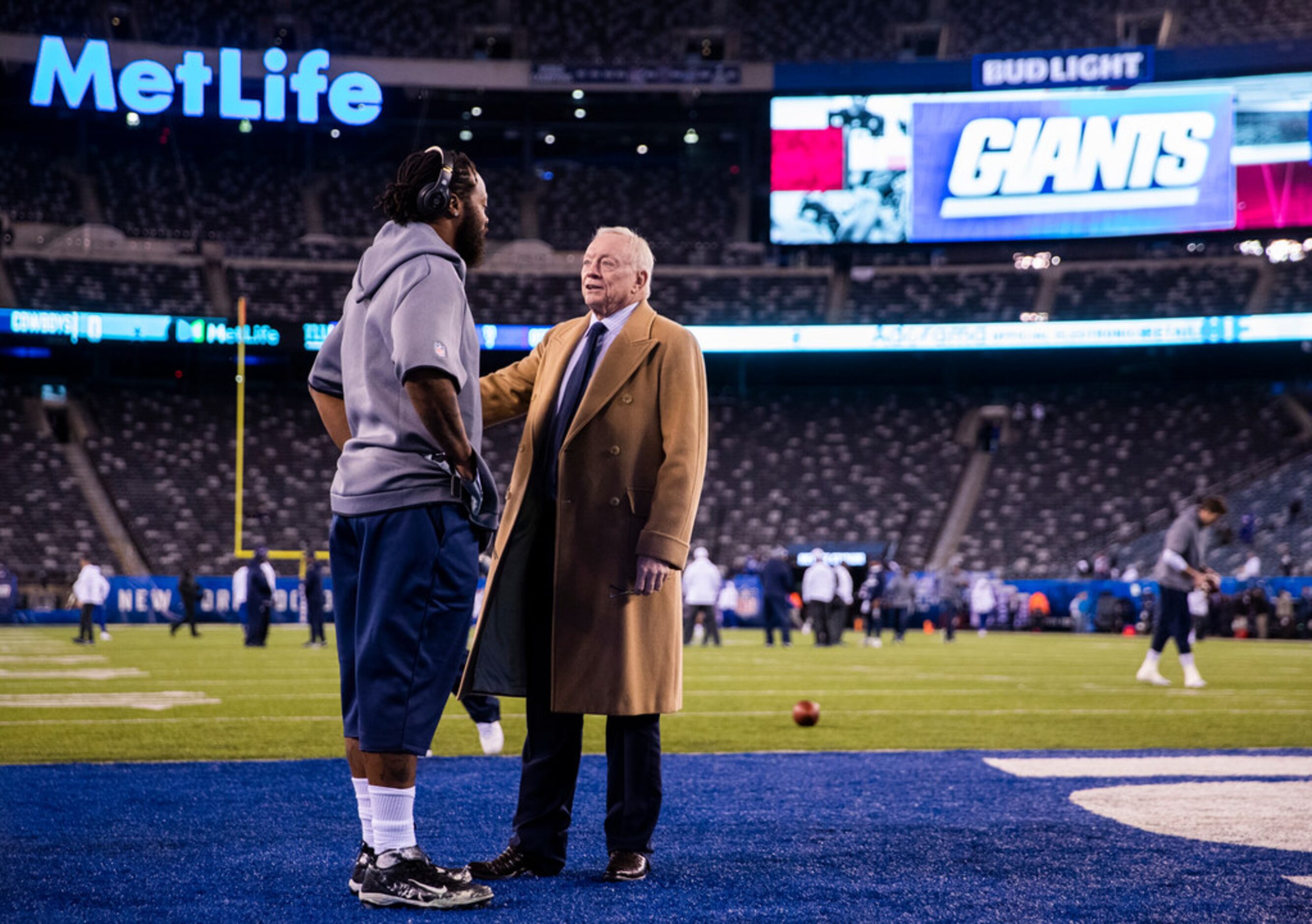 Dallas Cowboys Owner Jerry Jones talks with Dallas Cowboys defensive end Michael Bennett...