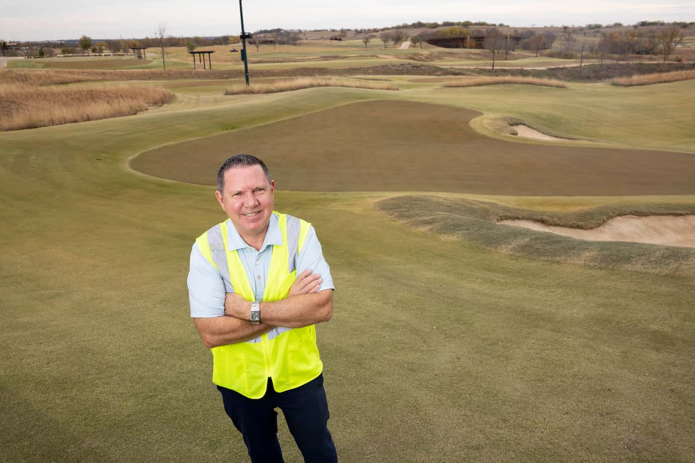 Jeff Smith, vice president and managing director of the Omni PGA Frisco Resort, poses for a...