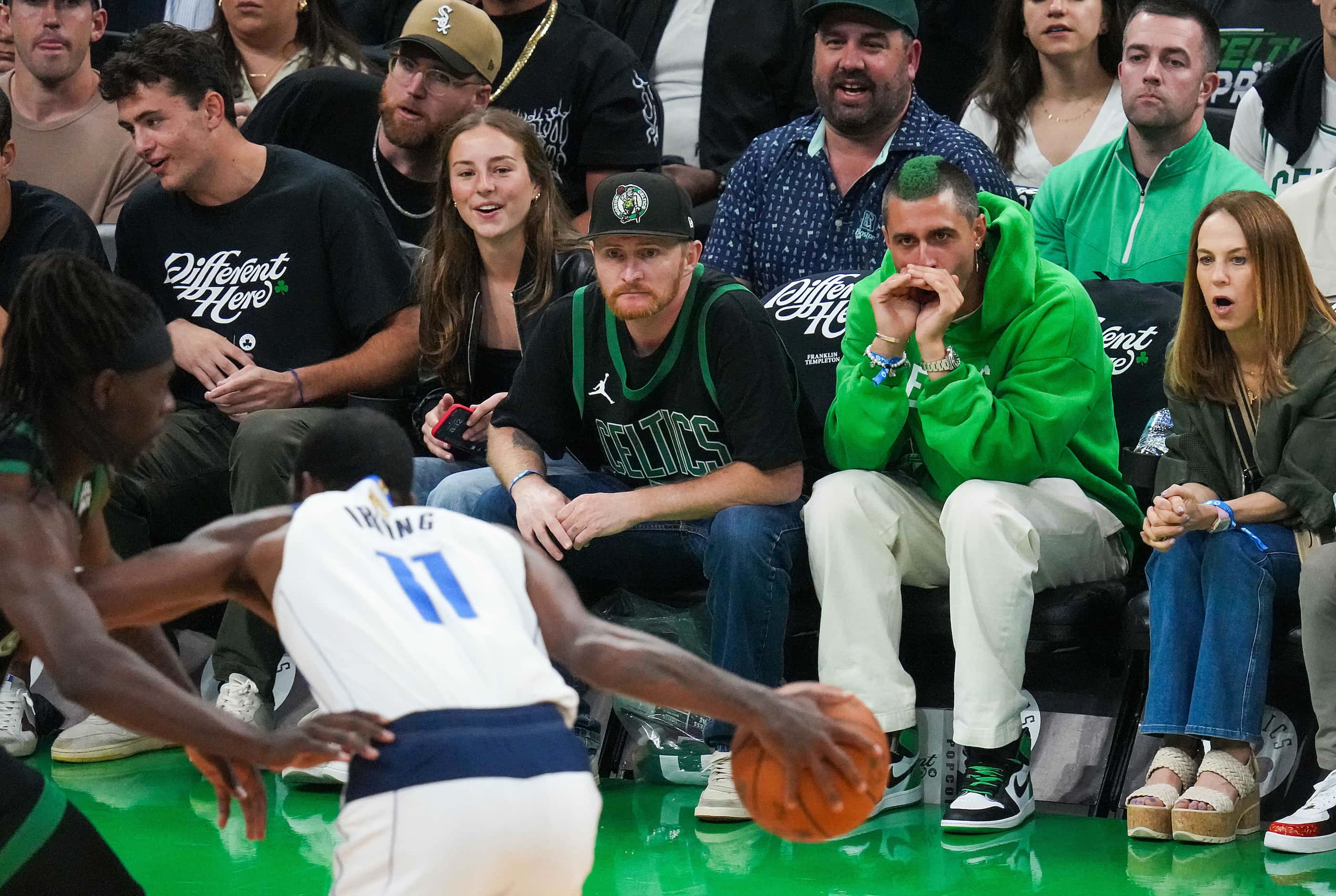 Boston Celtics fans boo Dallas Mavericks guard Kyrie Irving (11) during the first half in...