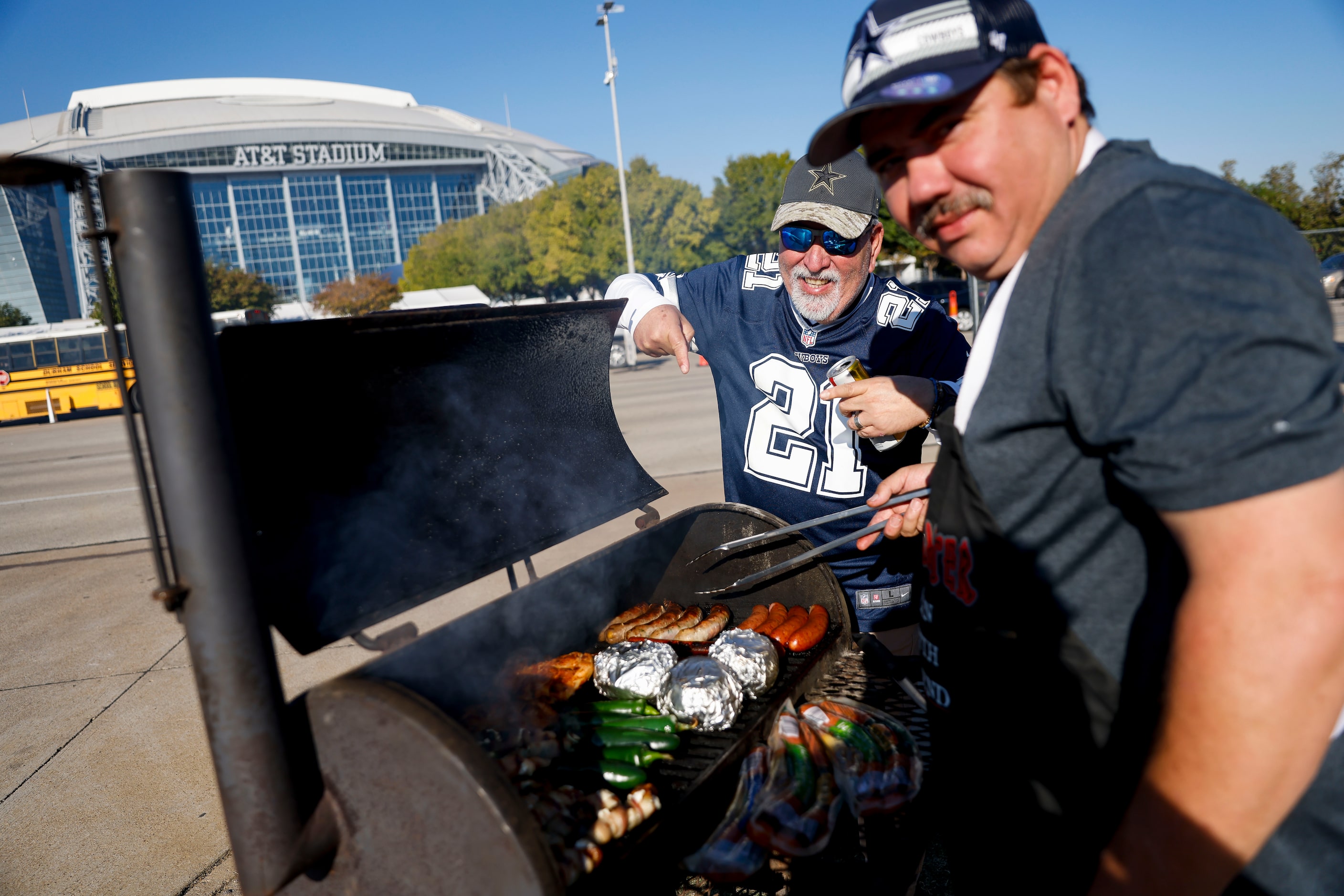 Johnny Cavazos and Sam Cuellar from Weslaco tailgate before the Washington Commanders at...