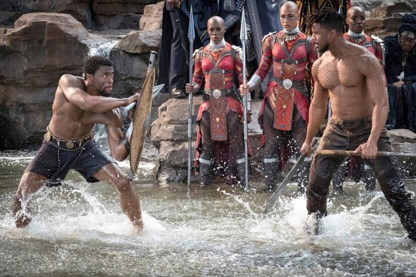 Chadwick Boseman, left, is King T'Challa and Michael B. Jordan is Erik Killmonger in "Black...