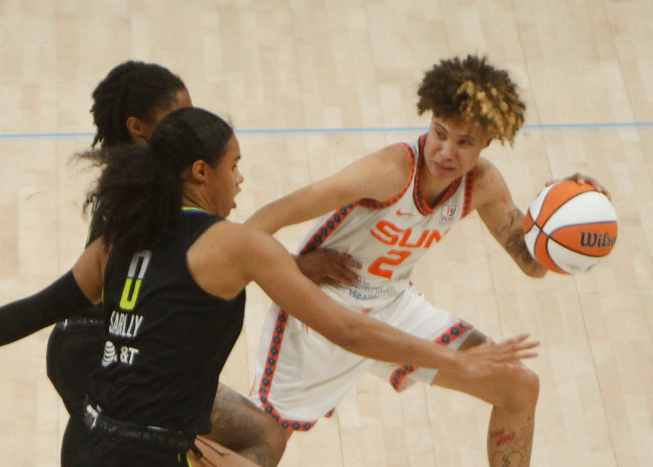 Dallas Wings forward Satou Sabally (0) pressures Connecticut Sun guard Natisha Hiedeman (2)...