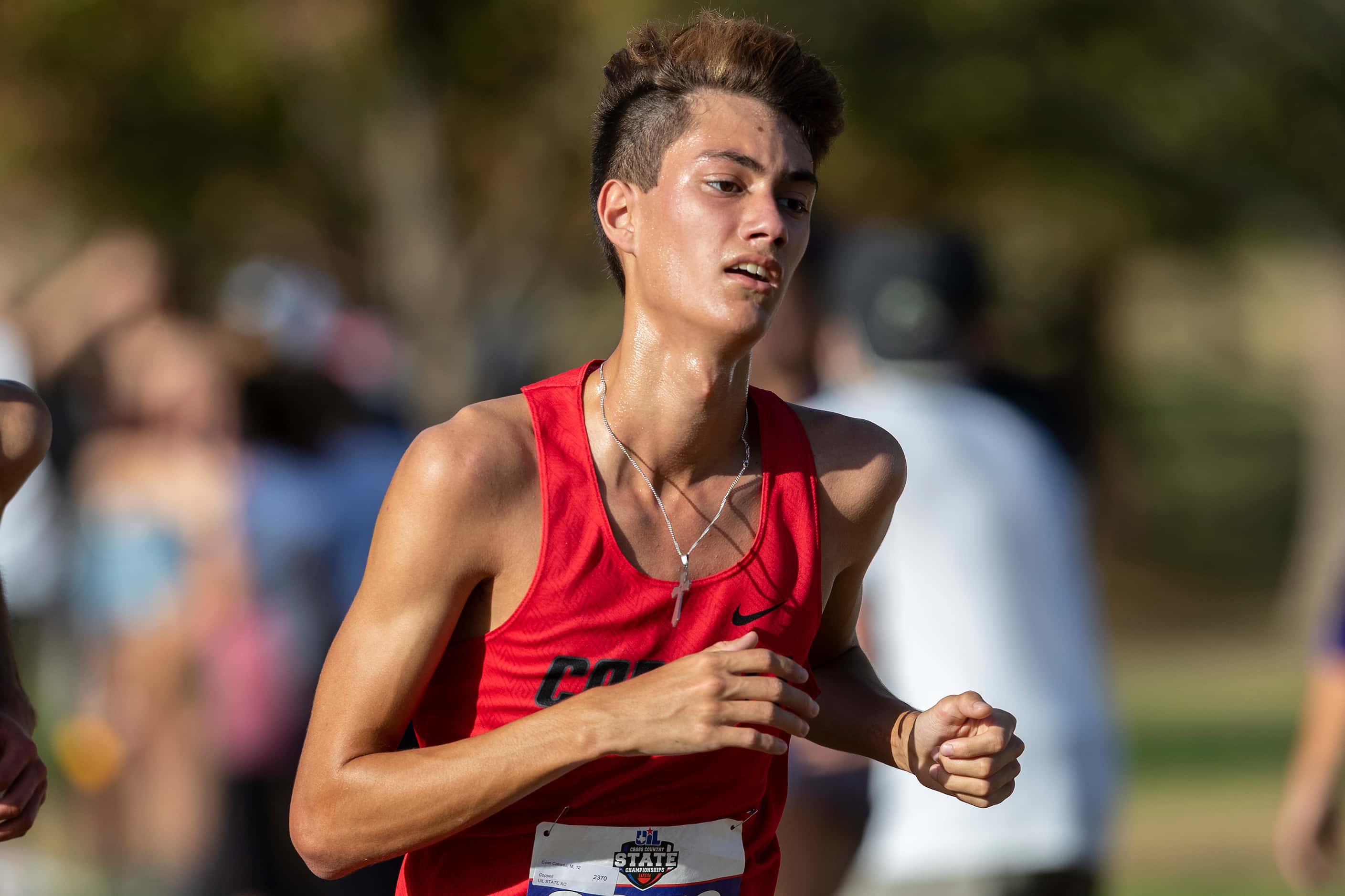 Coppell's Evan Caswell (2370) finishes eighth in the boys UIL Class 6A state cross country...