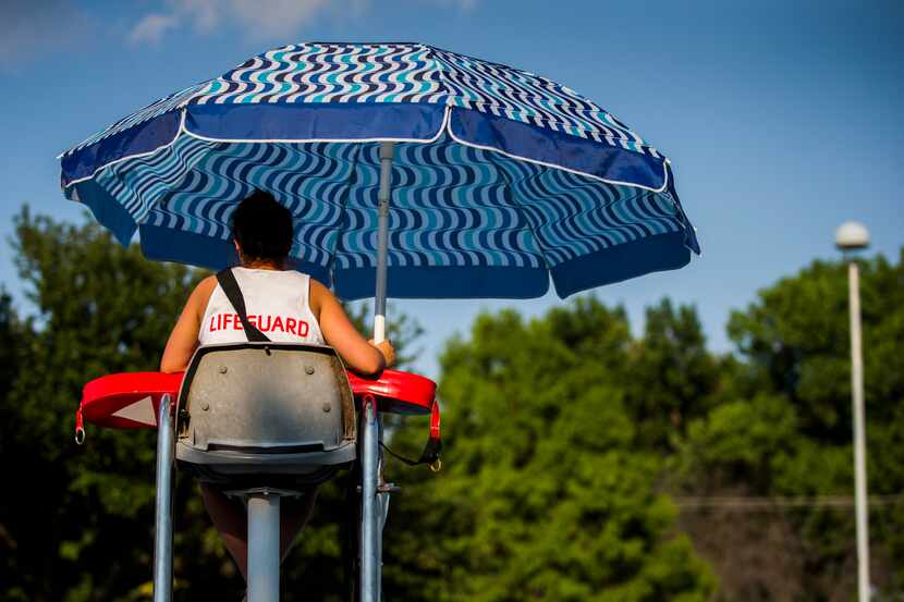 A lifeguard watches the pool at the Richardson Family YMCA in Richardson.