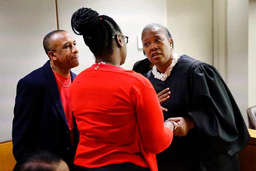 Judge Tammy Kemp gives her sympathies to Botham Jean's parents, Allison and Bertrum Jean...