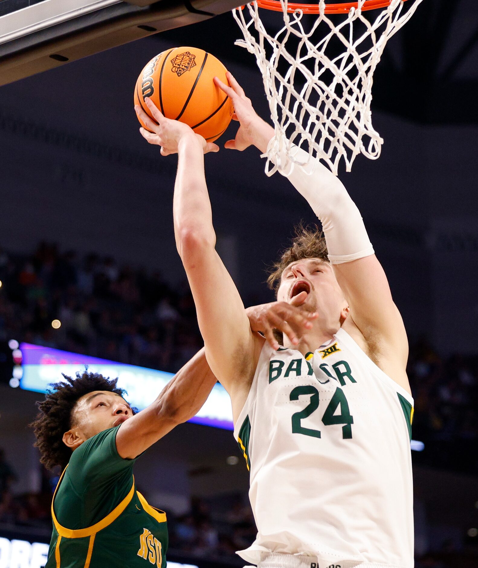 Norfolk State Spartans guard Terrance Jones (2) folds Baylor Bears guard Matthew Mayer (24)...