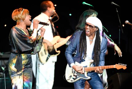 Nile Rodgers, right, performs with his band in 2016.