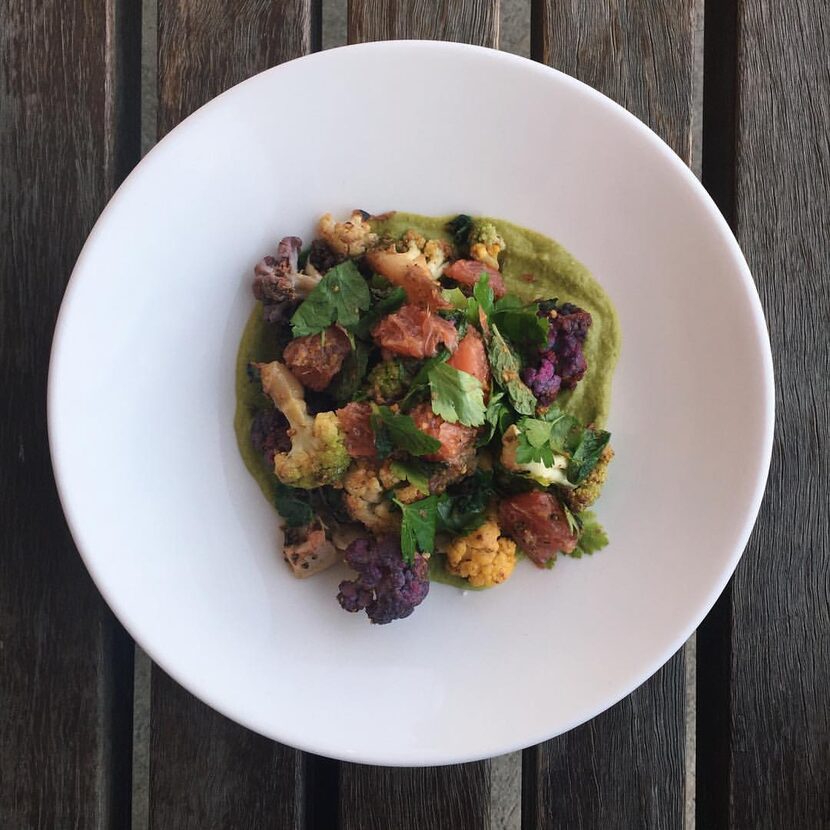 Roasted cauliflower with green mole, grapefruit, parsley, mint and charred tortilla, one of...