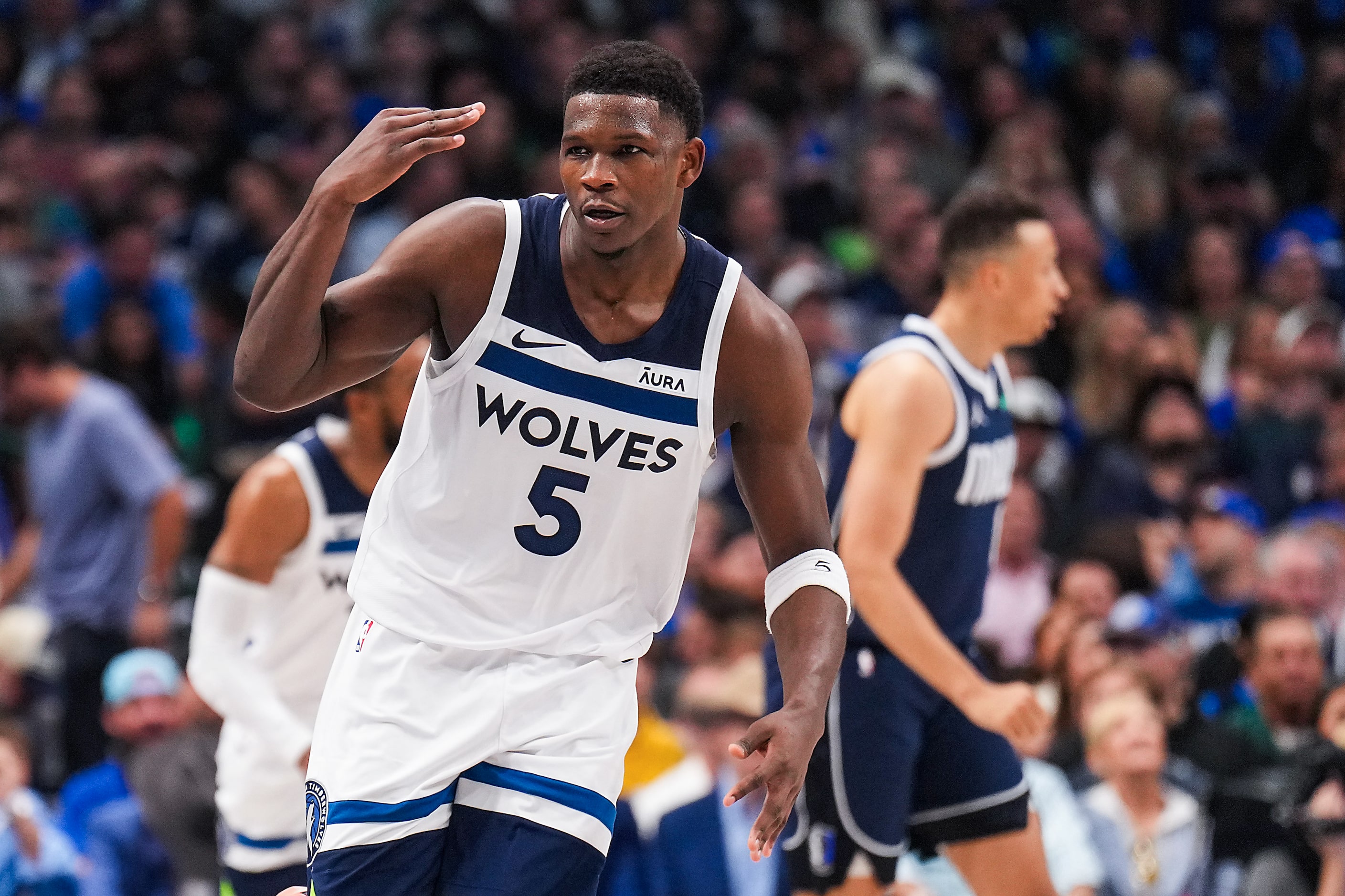 Minnesota Timberwolves guard Anthony Edwards (5) celebrates after a 3-pointer during the...