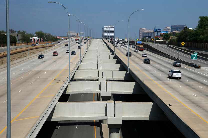 Vehicles make their way through Interstate 635 (outer lanes) and Interstate 635 Express toll...