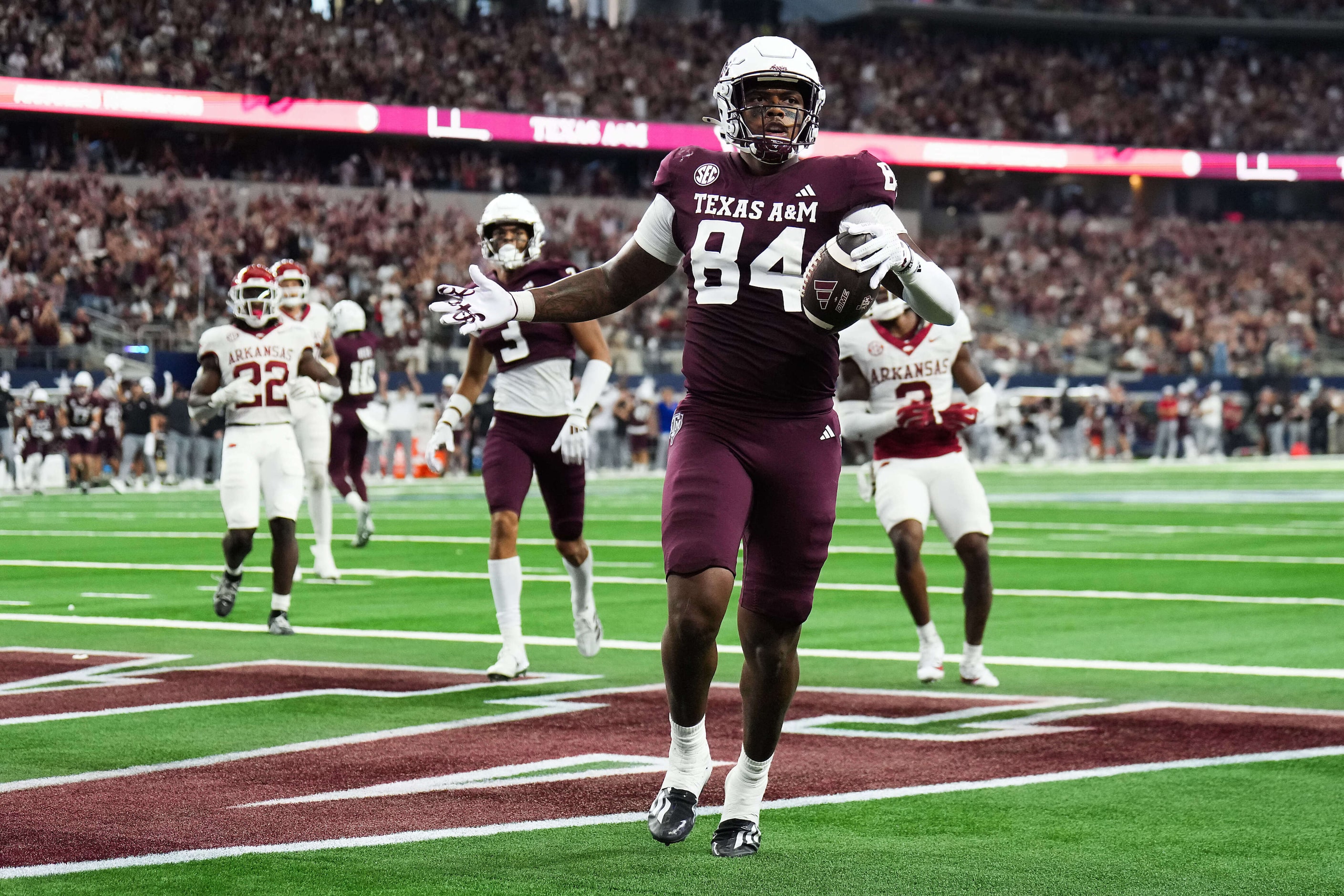 Texas A&M tight end Tre Watson (84) celebrates after scoring a touchdown during the second...