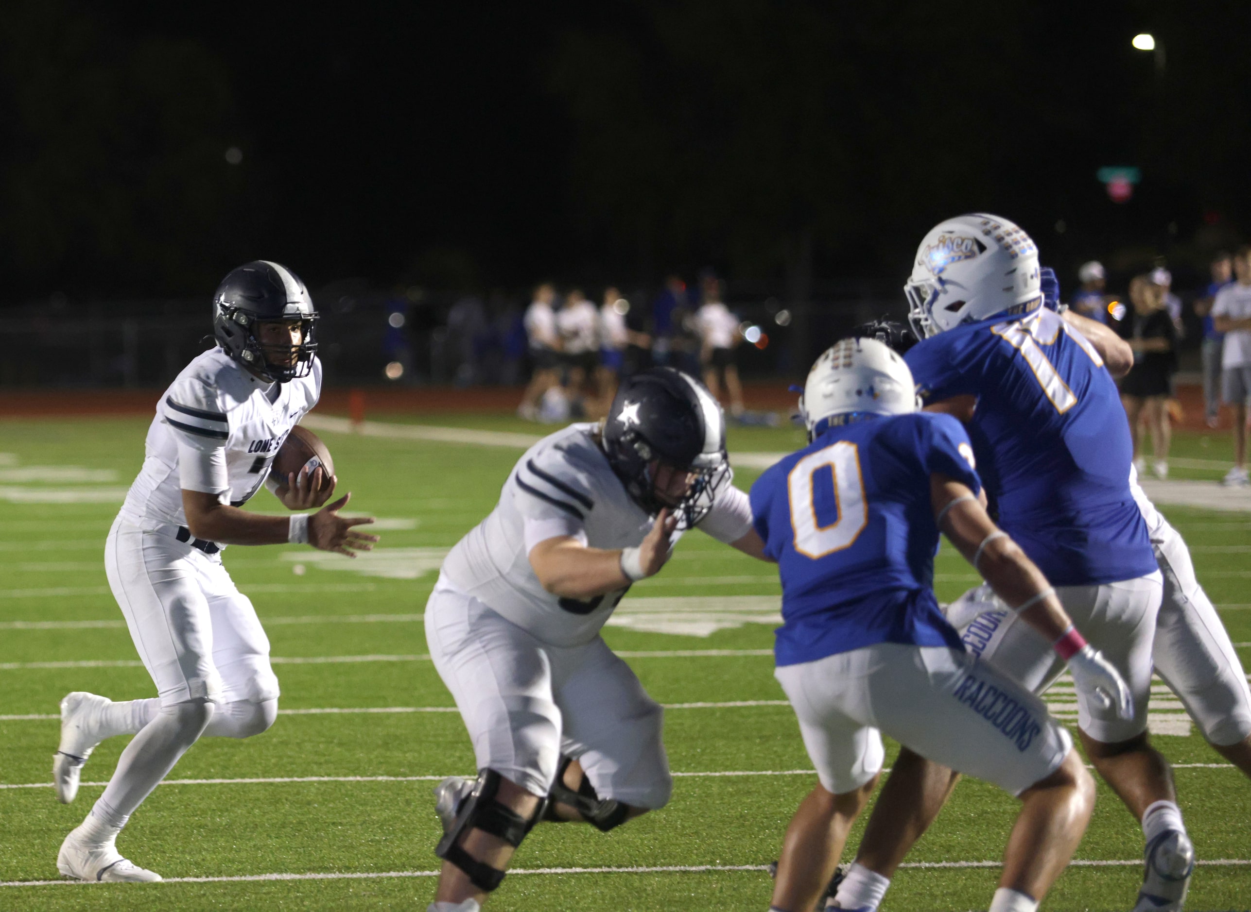 Lone Star player #7 Karece Hoyt attempts a quarterback sneak during the Frisco Lone Star...