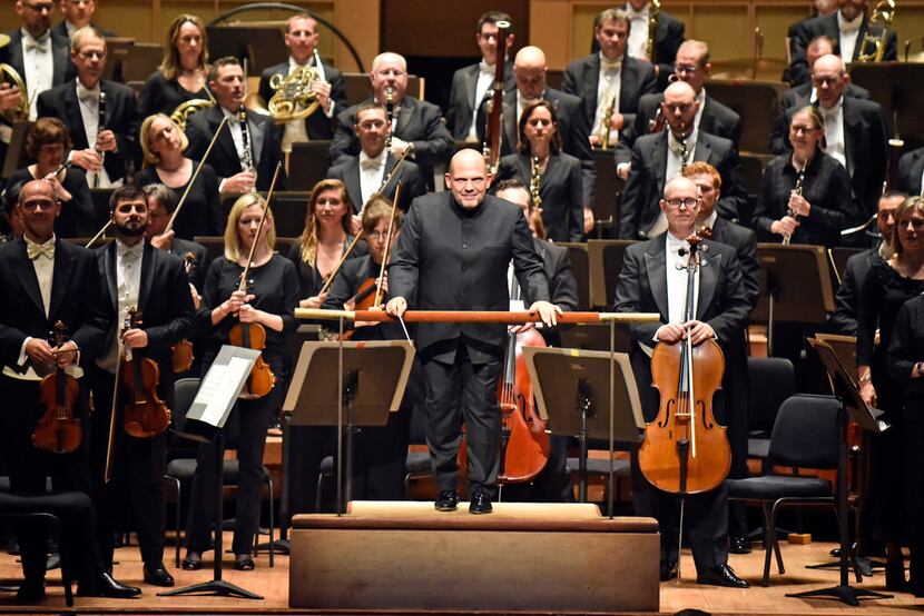 Dallas Symphony Orchestra conductor Jaap van Zweden walks on stage before a performance with...