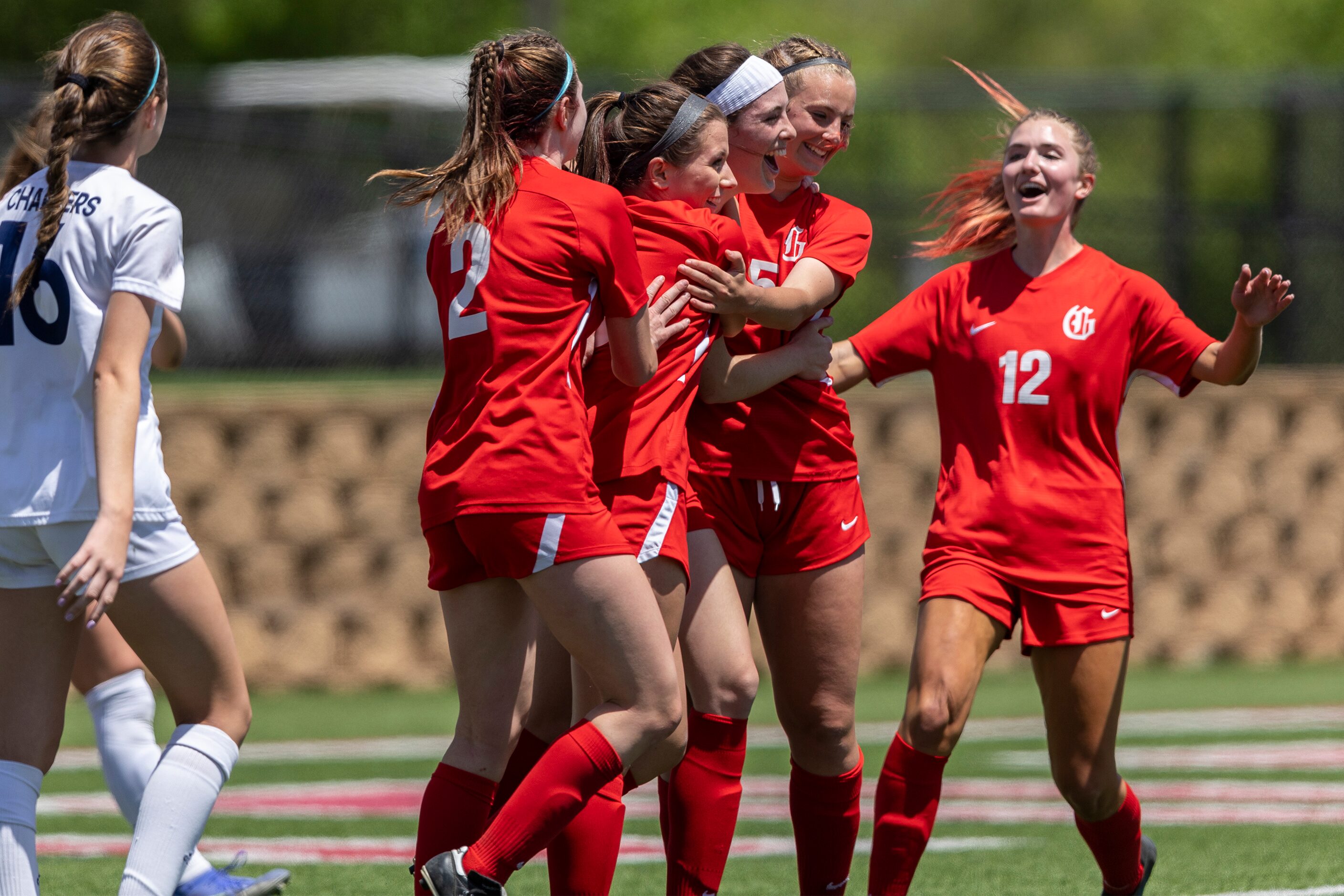 Grapevine celebrates a second goal by midfielder Kasten Merrill, center, during a Class 5A...