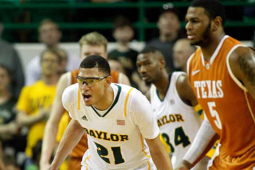 Baylor Bears center Isaiah Austin (21) yells to his teammates as they face Texas in the...