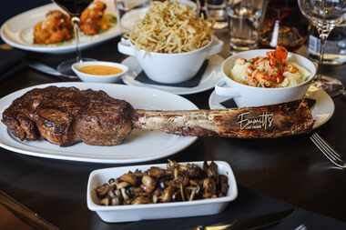 The menu star is a 44-ounce tomahawk steak with the name Emmitt’s laser-engraved on the...