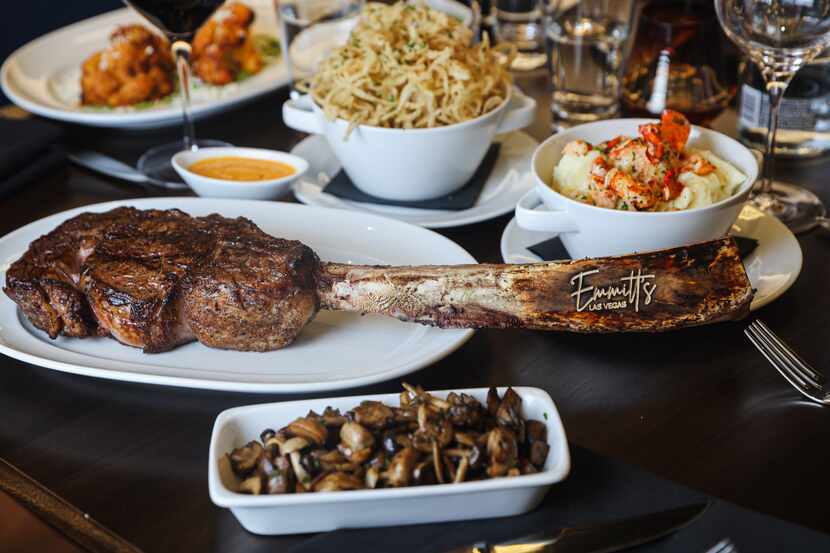 The menu star is a 44-ounce tomahawk steak with the name Emmitt’s laser-engraved on the...