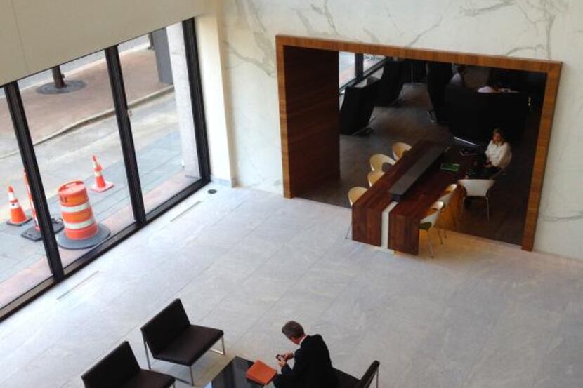 
The remodeled lobby at 2100 Ross in downtown Dallas includes gathering areas for workers.
