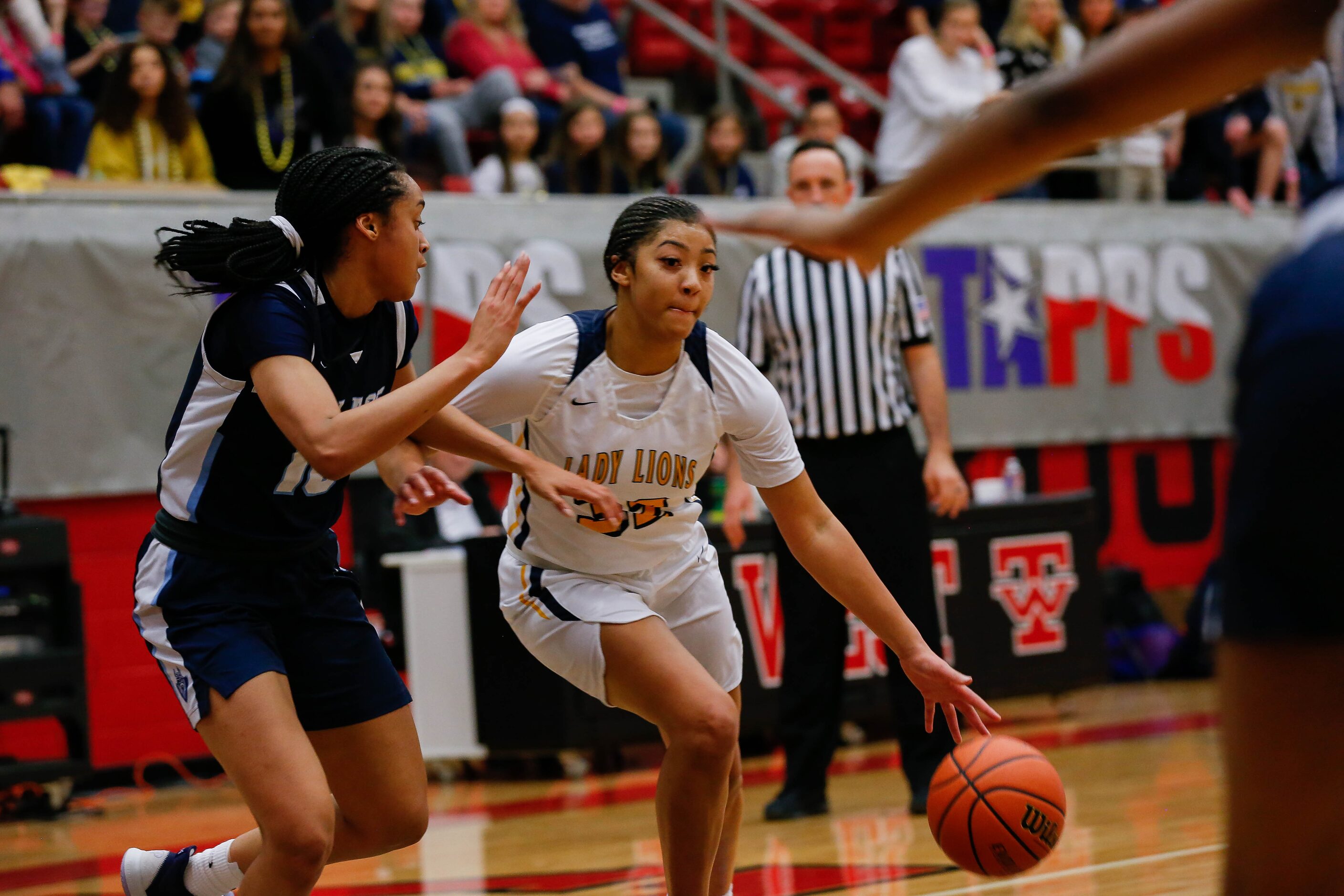 Plano Prestonwood Christian's Jordan Webster (32) drives through the Village School's...