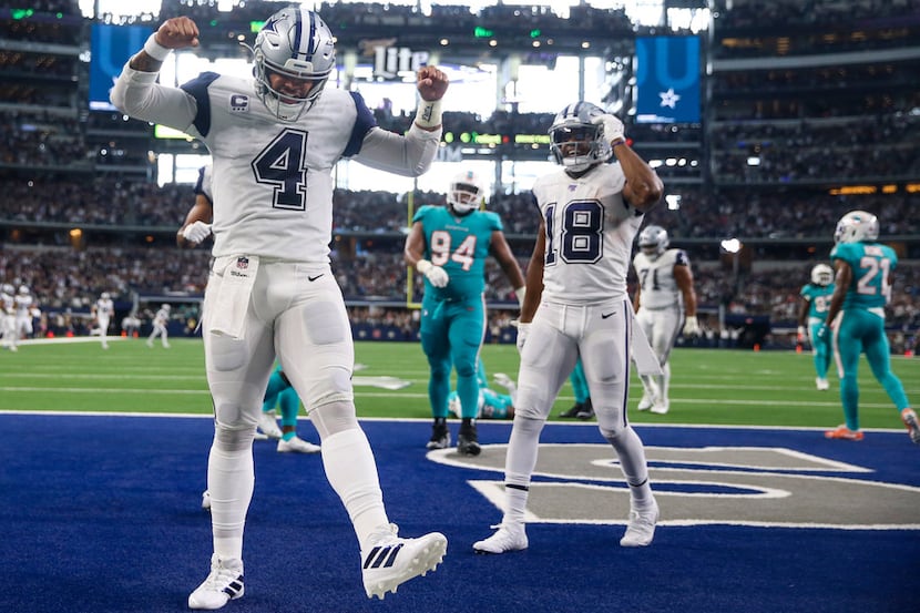 Dallas Cowboys quarterback Dak Prescott (4) celebrates after his touchdown during the second...