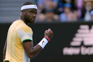Frances Tiafoe of the U.S. reacts after winning a point against Tomas Machac of the Czech...