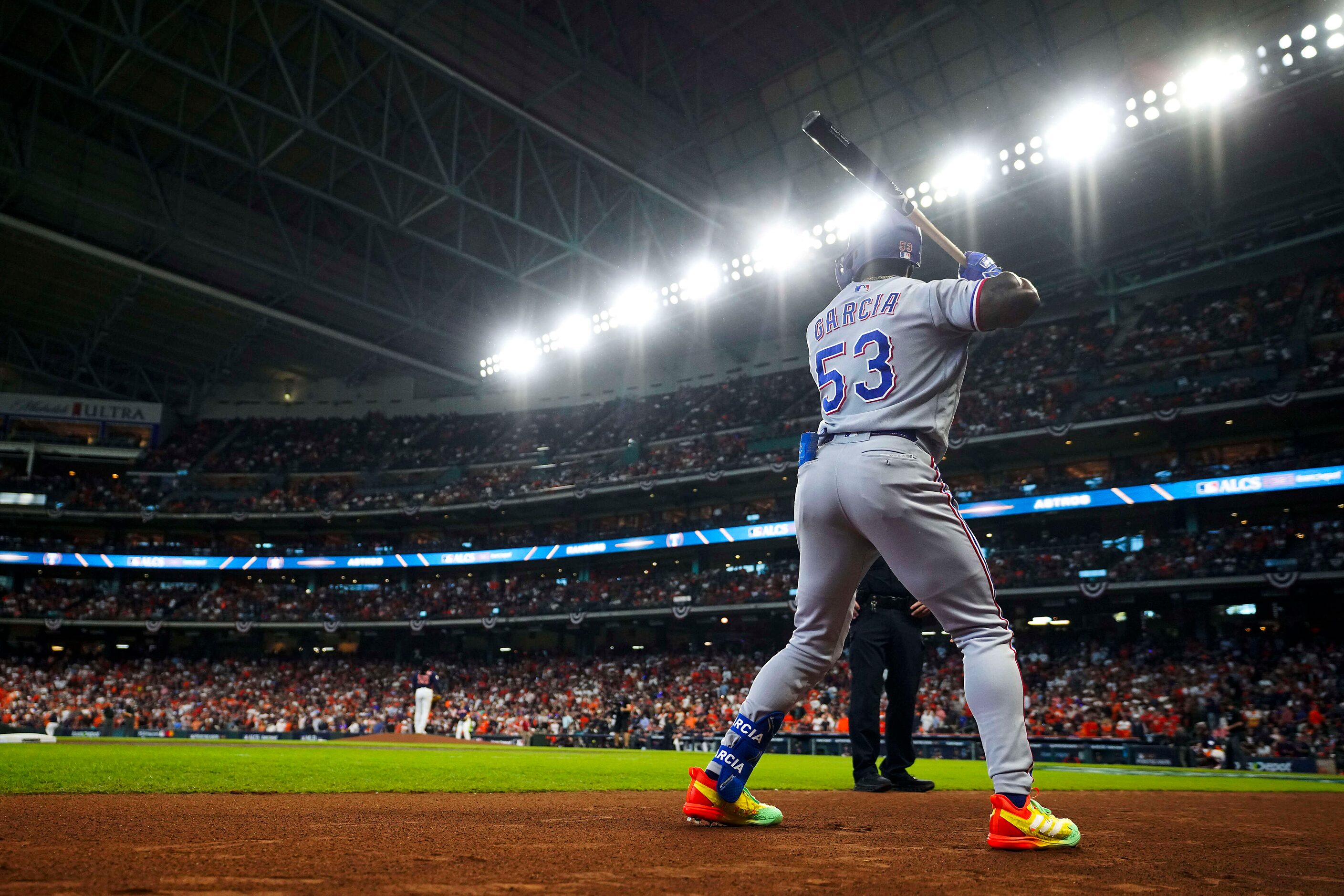 Texas Rangers right fielder Adolis Garcia prepares to bat during the first inning in Game 2...