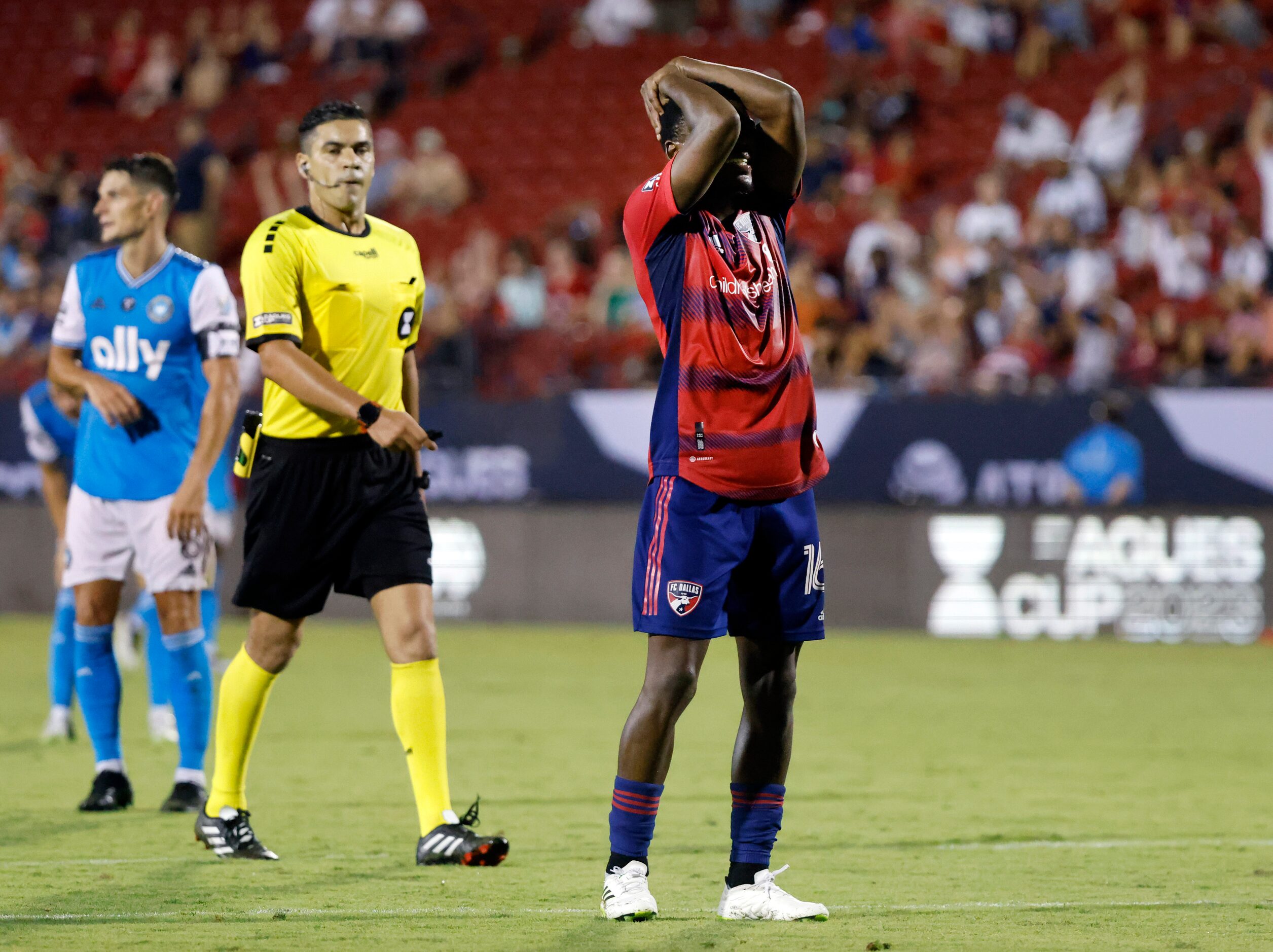 FC Dallas forward Tsiki Ntsabeleng (16) reacts after missing a shot late in the second half...