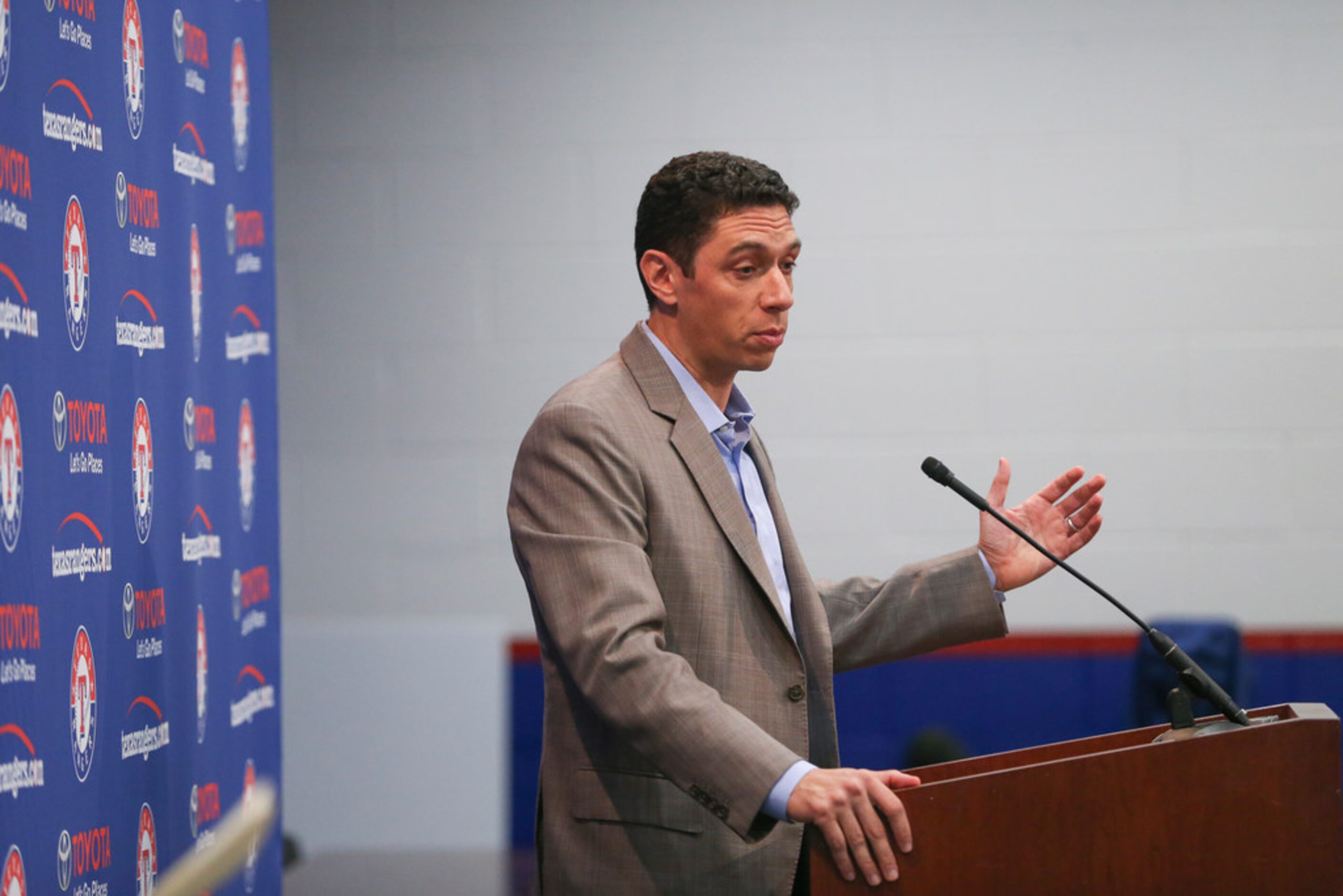 Rangers President of Baseball Operations and General Manager Jon Daniels addresses members...