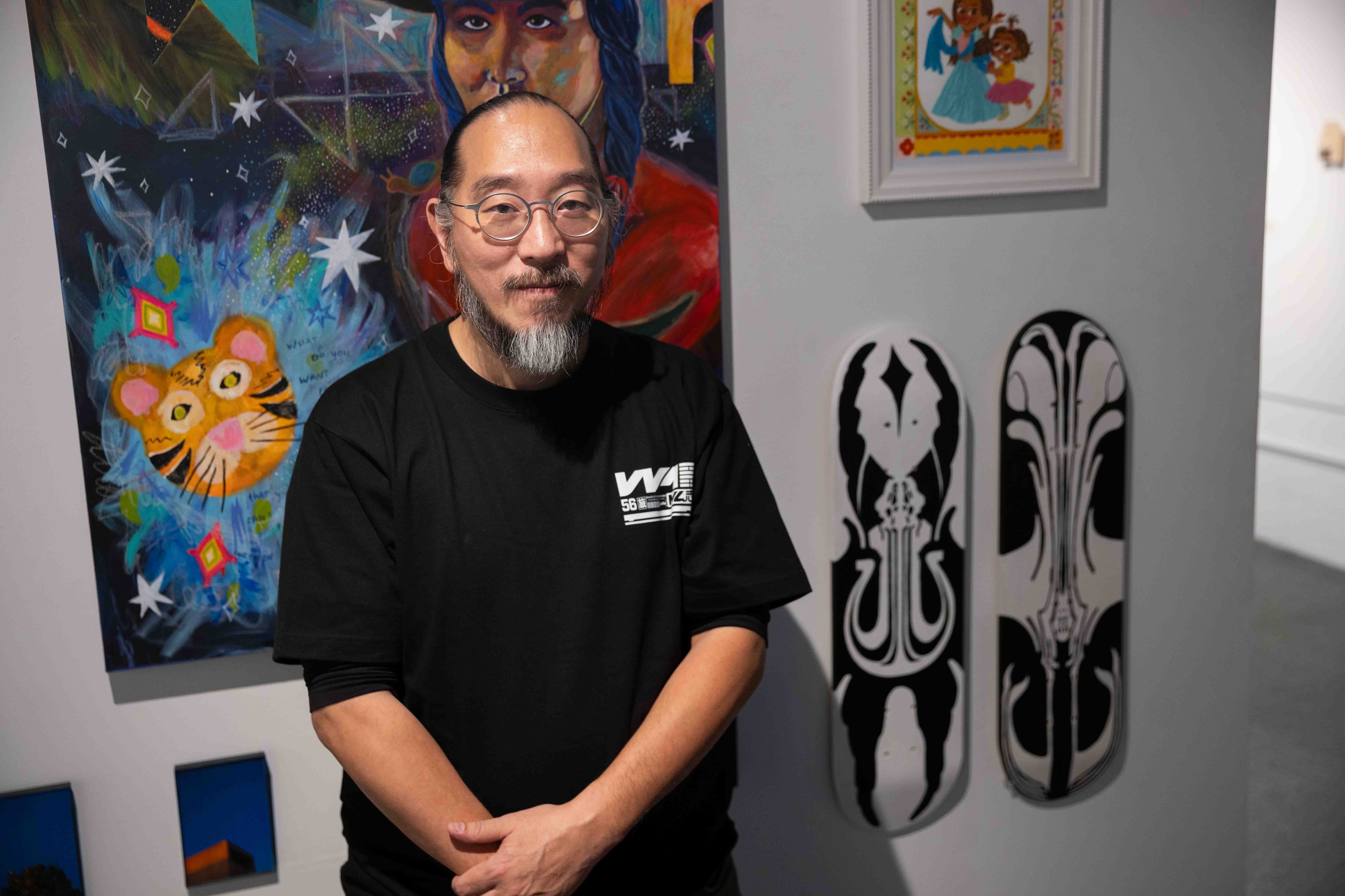 mario zie poses in front of his pieces “AEREA
AEQUORUM,” and “the Fairy & the Solonaut,...