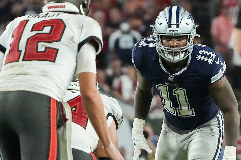 Dallas Cowboys linebacker Micah Parsons (11) eyes Tampa Bay Buccaneers quarterback Tom Brady...