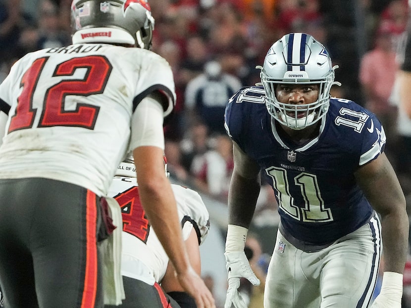 Dallas Cowboys linebacker Micah Parsons (11) eyes Tampa Bay Buccaneers quarterback Tom Brady...