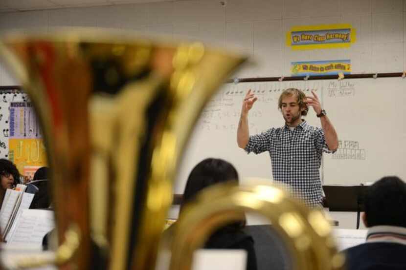 Band director Wes Walker leads his advanced band class during practice at Dallas ISD’s Boude...