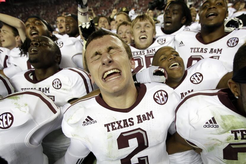 Texas A&M quarterback Johnny Manziel (2) reacts at the end of a 29-24 win over Alabama in an...