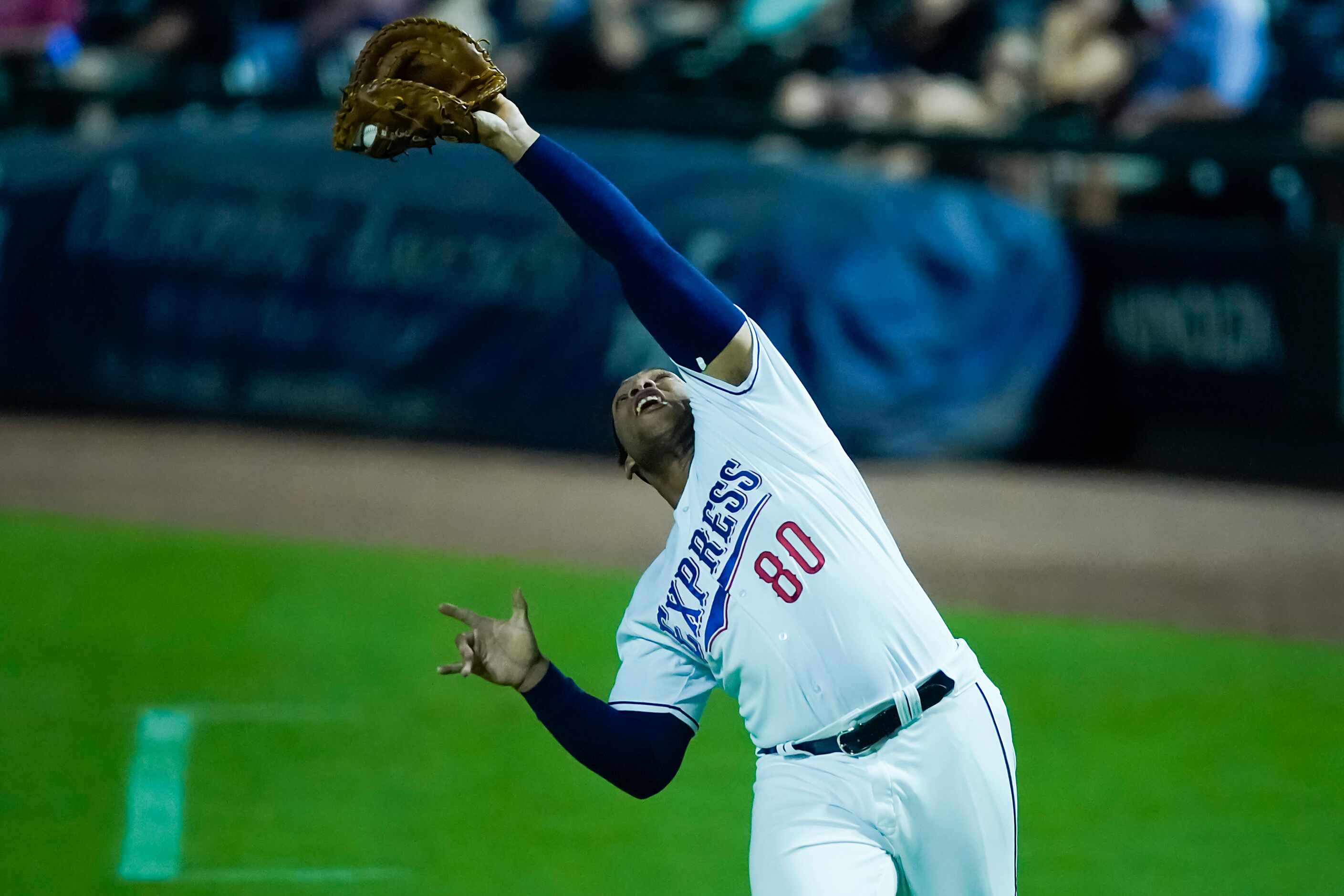 Round Rock Express first baseman Curtis Terry makes a catch in foul territory on a popup off...
