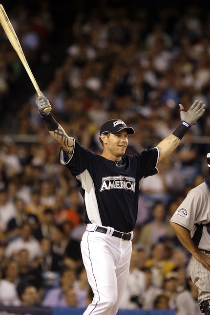 Texas Rangers' Josh Hamilton swings at the ball during the Major League Baseball All-Star...