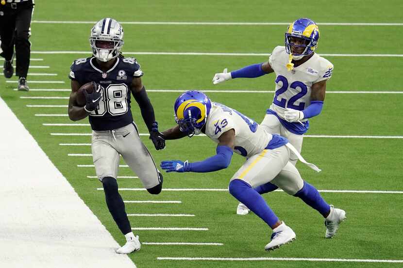 Dallas Cowboys wide receiver CeeDee Lamb (88) runs after a catch against the Los Angeles...