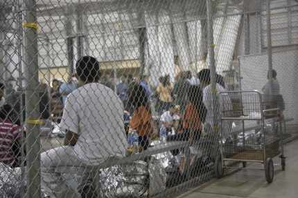 This US Customs and Border Protection photo dated June 17 shows the intake of refugees by...