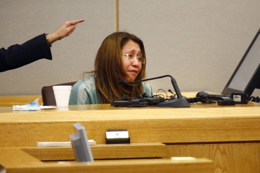 Elizabeth Escalona wept when prosecutor Eren Price asked her to count the bruises she...