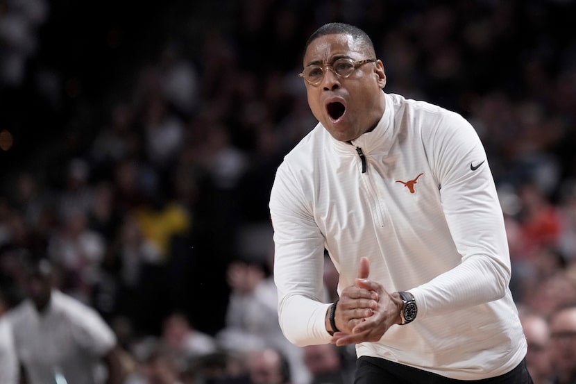 Texas head coach Rodney Terry yells to his defense against Texas A&M during the first half...